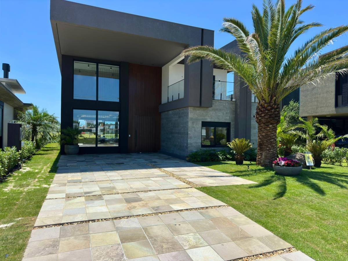 Casa em Condomínio 4 dormitórios para venda, Capão Novo - Posto 04 em Capão da Canoa | Ref.: 1510